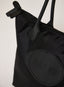 Black bag with 'Dès Vu' branding on a white background