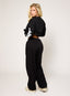 Black oversized joggers with white embroidered DÈSVU 422 logo on hip-4