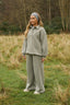 The image shows the Dès Vu Farmhouse Collection Polo Jumper and Wide Leg Joggers in colour Olive