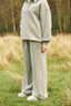The image shows the Dès Vu Farmhouse Collection Polo Jumper and Wide Leg Joggers in colour Olive