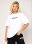 Model wearing oversized white 422 DÈSVU logo t-shirt with black embroidery-1