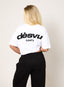 Model wearing oversized white 422 DÈSVU logo t-shirt with black embroidery-5