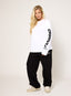 White long sleeve top with black 422 DÈSVU logo printed down the sleeves-3