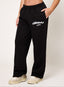 Black oversized joggers with white embroidered DÈSVU 422 logo on hip-1