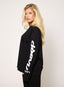 Oversized black long sleeve top with white DÈSVU 422 logo on both sleeves-2