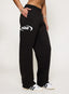Black joggers with 422 DÈS VU logo  on a plain background