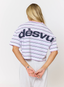 Model wearing lilac striped tee with 'des vu' branding on a white background.