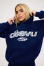 Navy blue hoodie with 'DÈS VU' logo on a white background