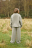 The image shows the Dès Vu Farmhouse Collection Polo Jumper and Wide Leg Joggers in colour Olive