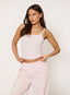 Woman wearing pink double layer vest top with '422' branding on a white background.
