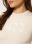 Closeup of stone t-shirt with '422' branding on a white background.