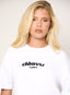Model wearing oversized white 422 DÈSVU logo t-shirt with black embroidery-3
