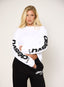 White long sleeve top with black 422 DÈSVU logo printed down the sleeves-1