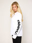 White long sleeve top with black 422 DÈSVU logo printed down the sleeves-2